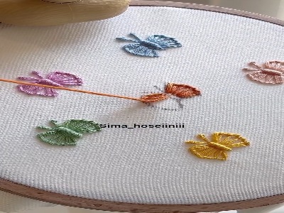 گلدوزی بامزه با پروانه